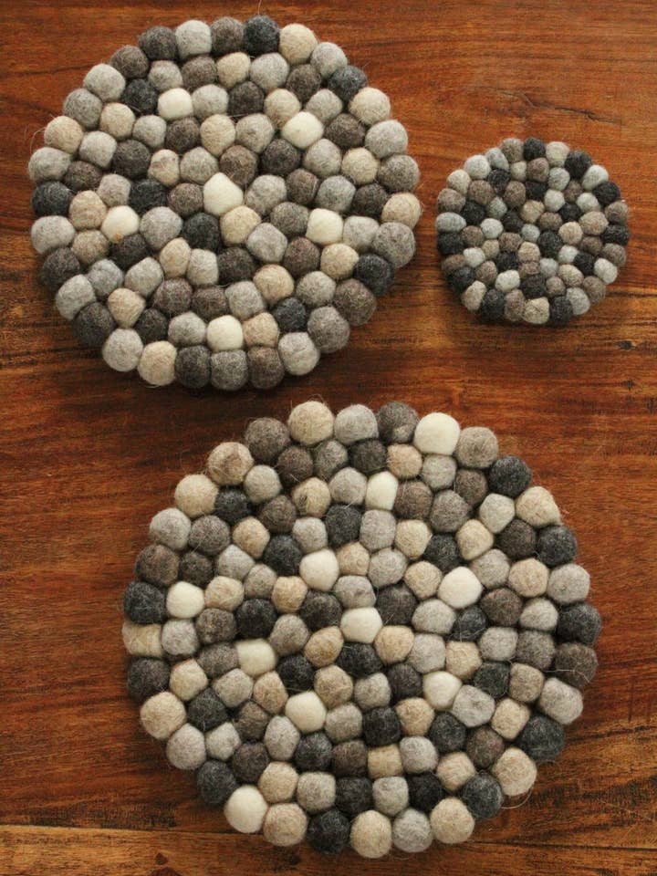 Finisterre Handmade Felt Pebble Trivet Natural Wool for wholesale by Pachamama Ltd