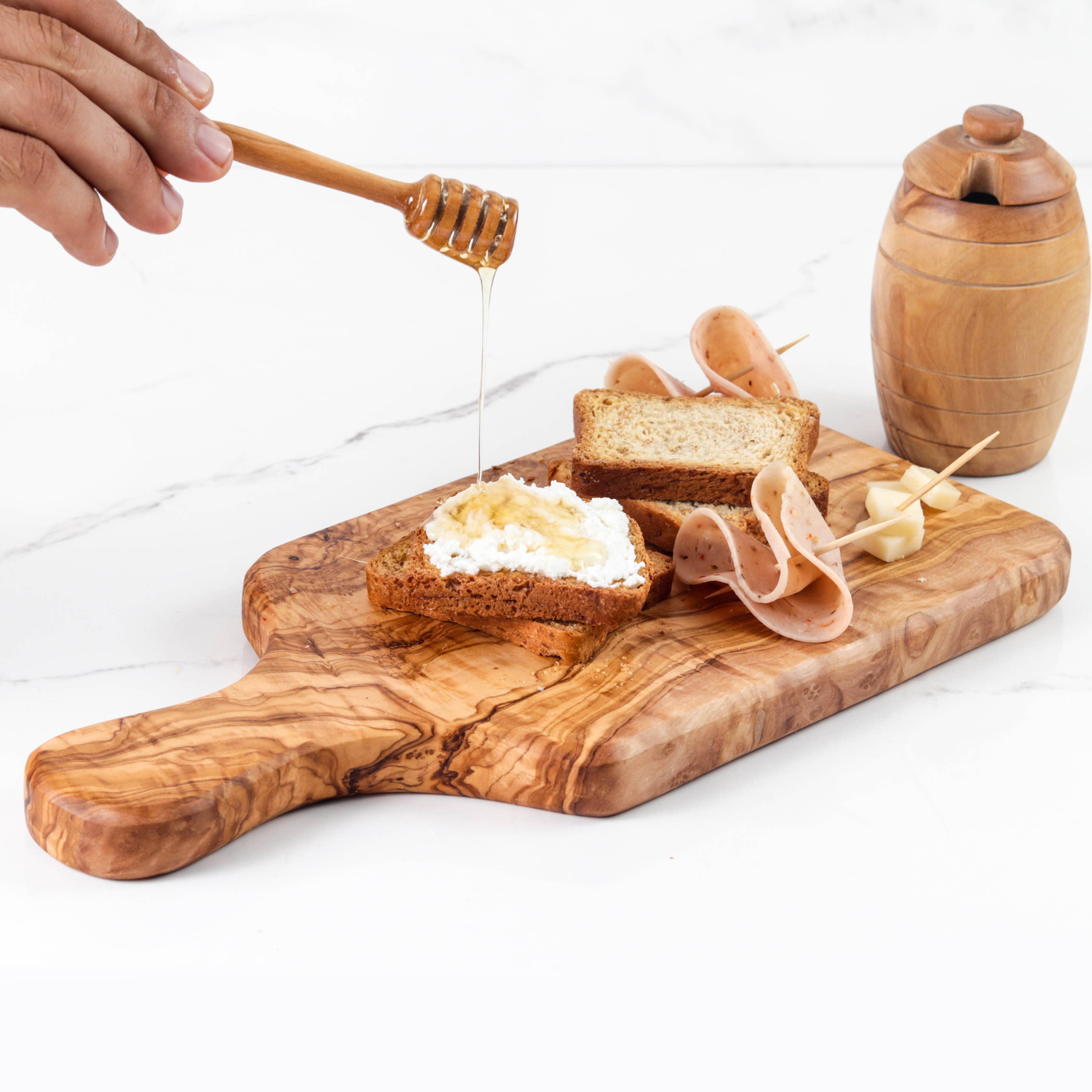 ArtisRaw Olive Wood - Wholesale Cutting Board - Rectangular Cutting Board with integrated circular handles2