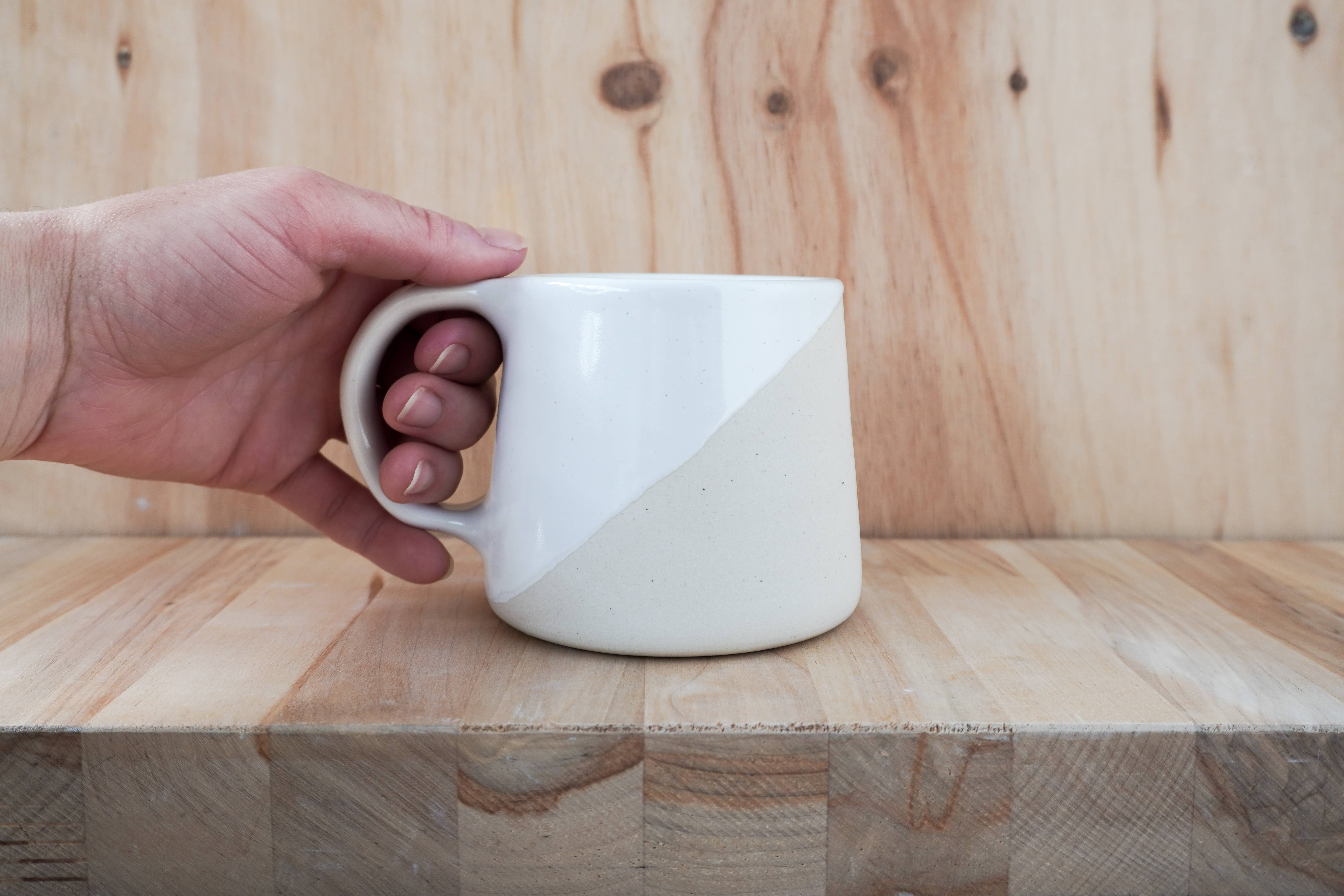 Shelby Page Ceramics - Wholesale Coffee Mug - Classic Taper Mug - Angle Dip2