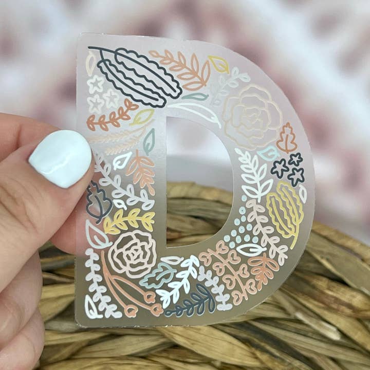 Floral D Sticker. Clear Matte Letter Sticker. Weatherproof Vinyl Sticker. for wholesale by Nolie Co