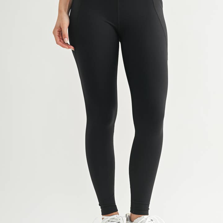 Tapered Band Essential Solid Highwaist Leggings and other Purchase Wholesale legging. Free Returns & Net 60 Terms on Faire trending on Faire.