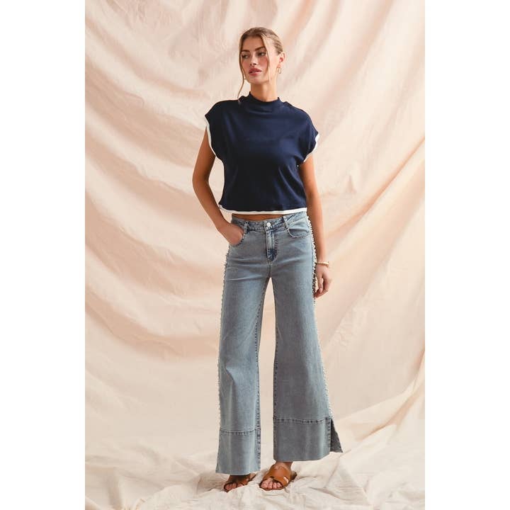 Mid Rise Flare Bottom Denim Jeans With Side Pearl and other Purchase Wholesale jeans with pearls. Free Returns & Net 60 Terms on Faire trending on Faire.