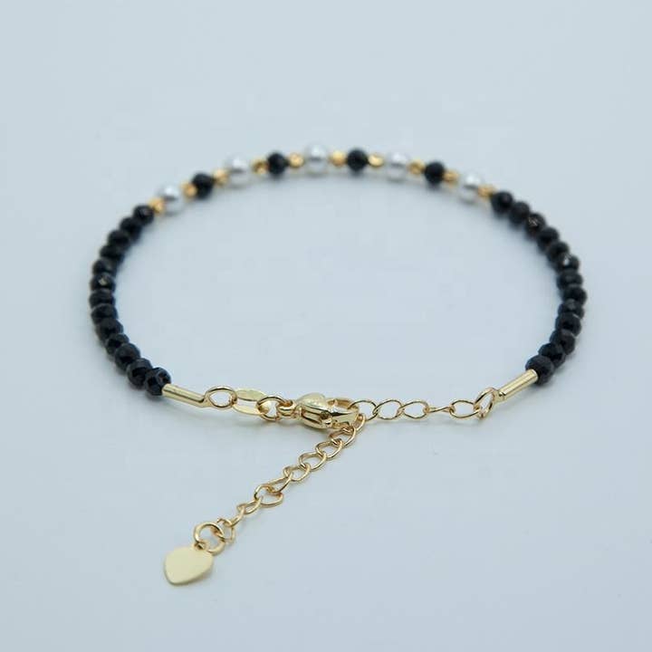 Artisans de Madagascar – wholesale Beaded bracelet – Black Tourmaline Bracelets Faceted Beads between 3 & 4 mm4