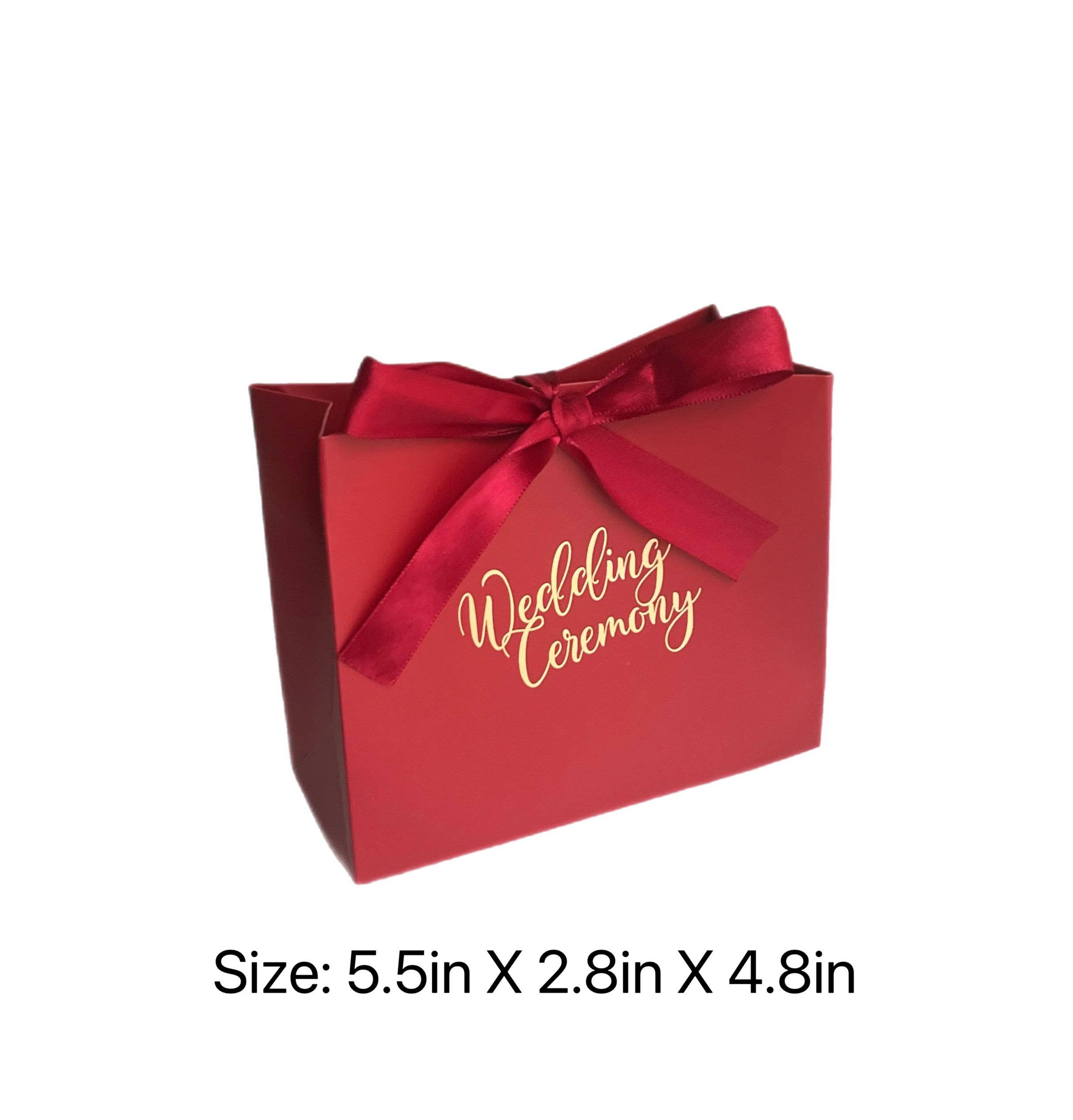 Rosso Borsa regalo rossa in carta con nastro per bomboniere e regali festivi in vendita all'ingrosso su Faire2