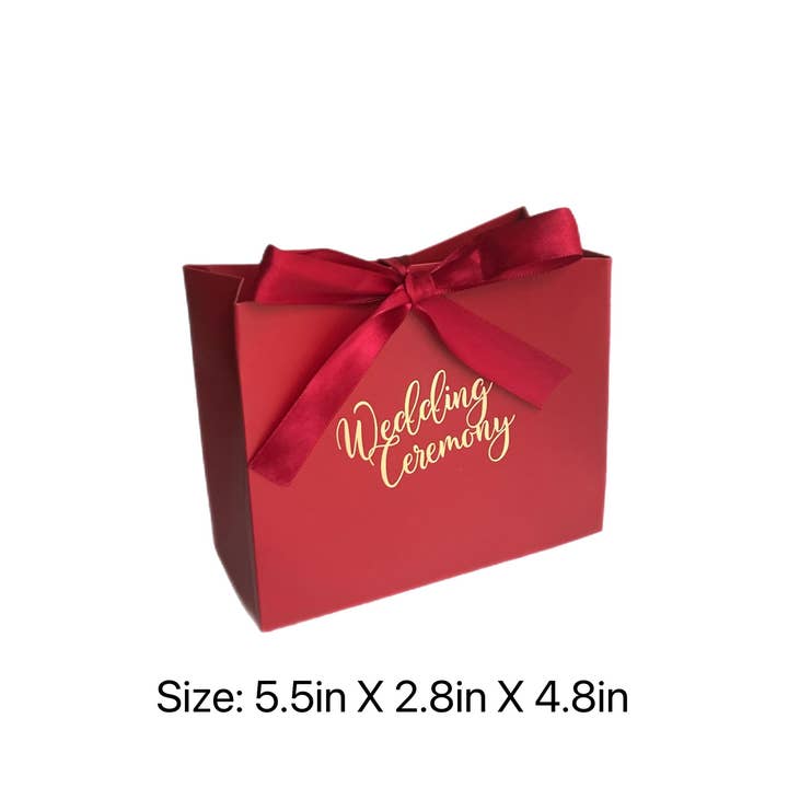 Rosso Borsa regalo rossa in carta con nastro per bomboniere e regali festivi in vendita all'ingrosso su Faire2