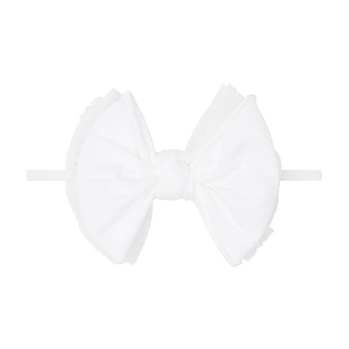 FAB® SKINNY en capas: tul con lunares blancos para venta al por mayor de Baby Bling Bows