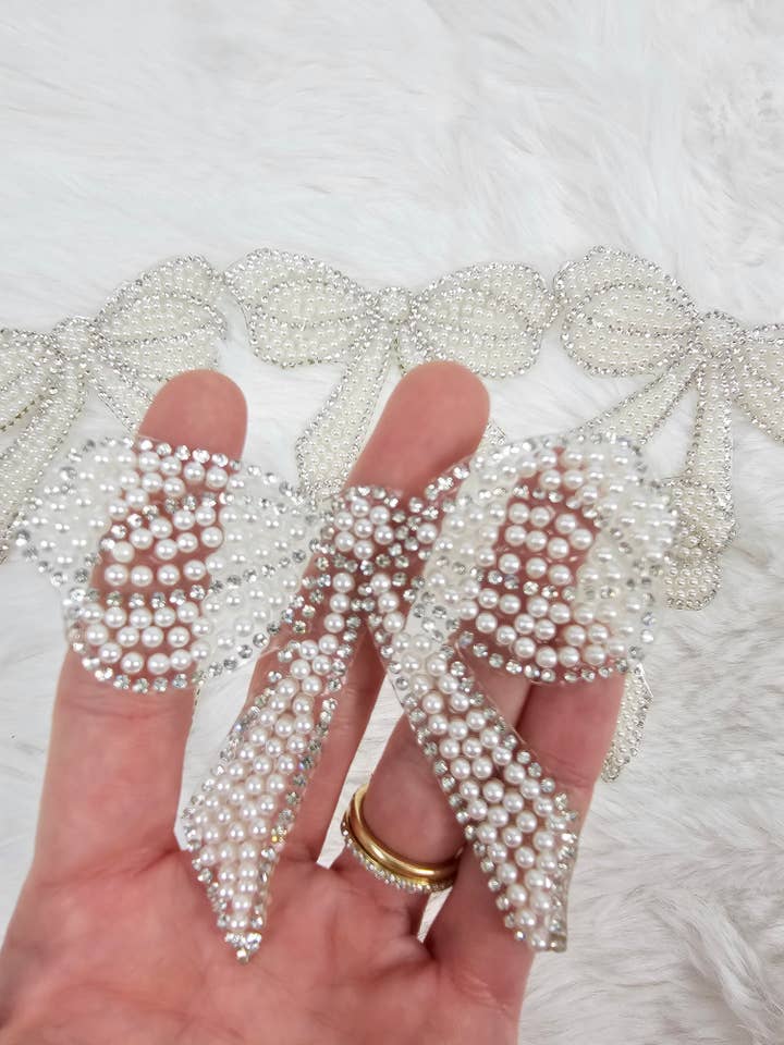 Rhinestone Bow with Silver Outline and White Pearl Iron-on Patch for wholesale by Scratch Decor