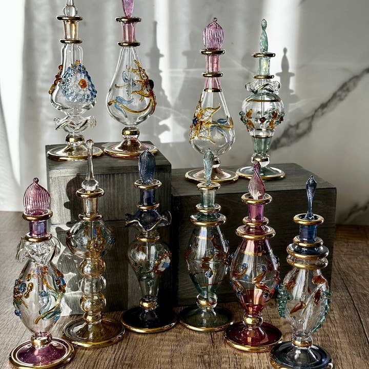 Luxury Embossed Glass Design Egyptian Handblown Perfume Bottles, Set of Five Variety and other Purchase Wholesale beautiful perfume bottles. Free Returns & Net 60 Terms on Faire trending on Faire.