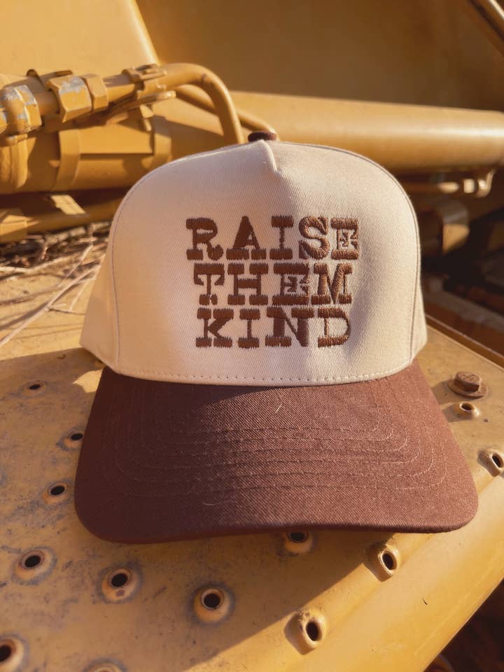Raise Them Kind Trucker Hat for wholesale by Charlie Grey