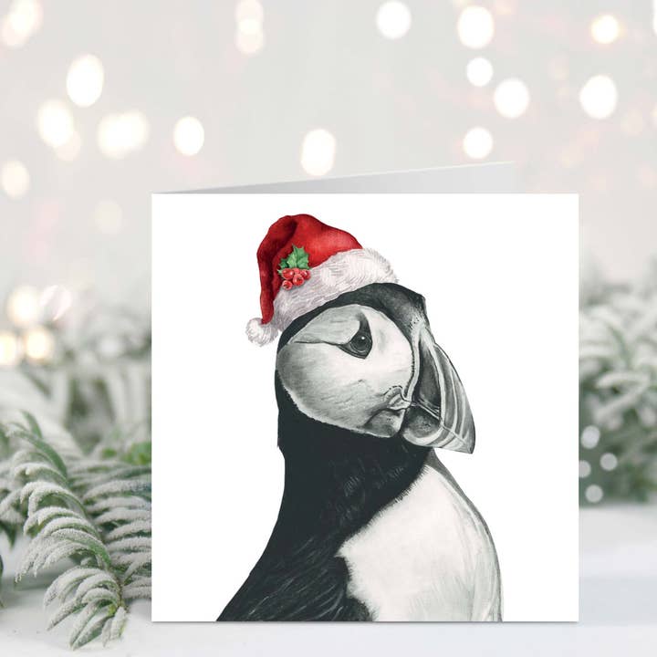 Vela the Puffin Santa Hat Festive Christmas Card for wholesale by Libra Fine Arts