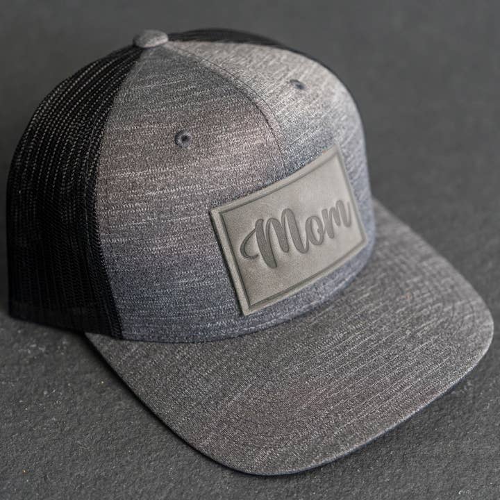 Leather Patch Performance Style Trucker Hat - Mom Stamp for wholesale by Ox & Pine