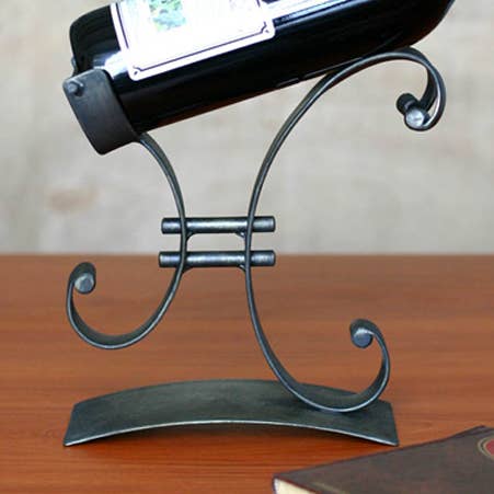Novica Handmade Close To You Iron Wine Bottle Holder for wholesale by NOVICA