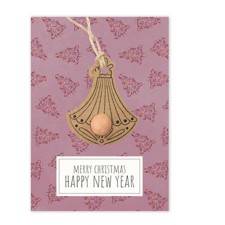 Decorazione con bomba di semi biologici su biglietto di Natale "Buon Natale" per la vendita all'ingrosso da parte di Blossombs