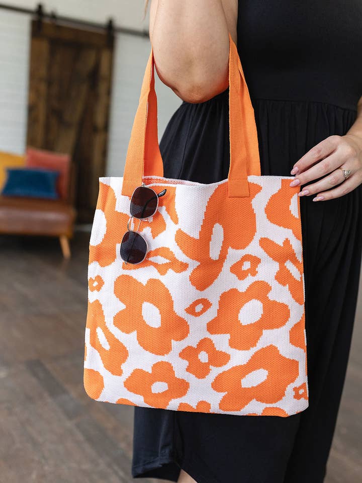 Lazy Daisy Knit Bag in Orange for wholesale by Avenue Wholesale