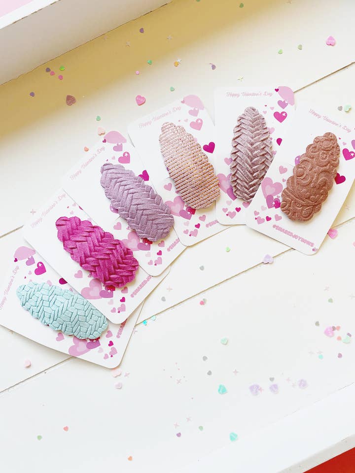 Clips a presión en forma de lágrima de piel auténtica para venta al por mayor de Shared Joy Bows