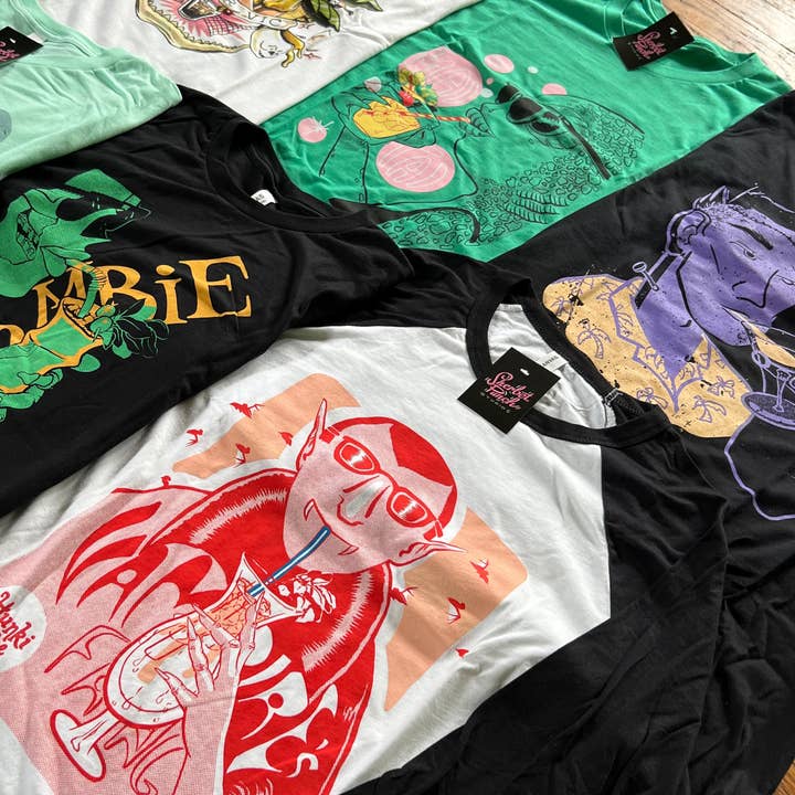 Sherbet Punch Studios - Wholesale T-Shirt (Graphic) - Unisex - Mystery Shirt, pin and sticker bundle