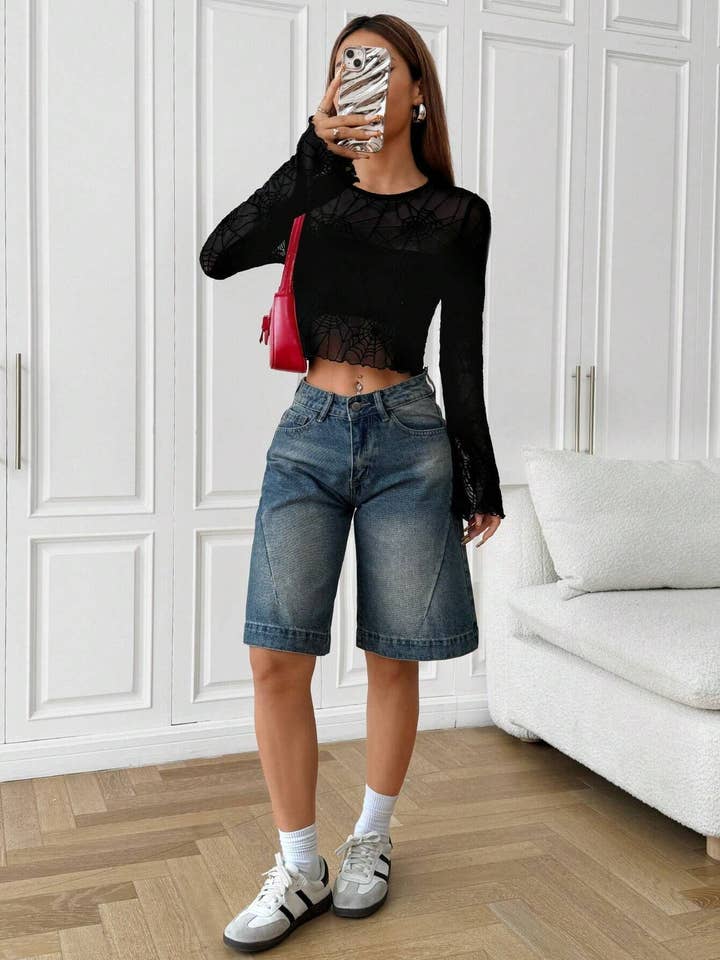 Black fungus edge spider web transparent T-shirt for wholesale on Faire4