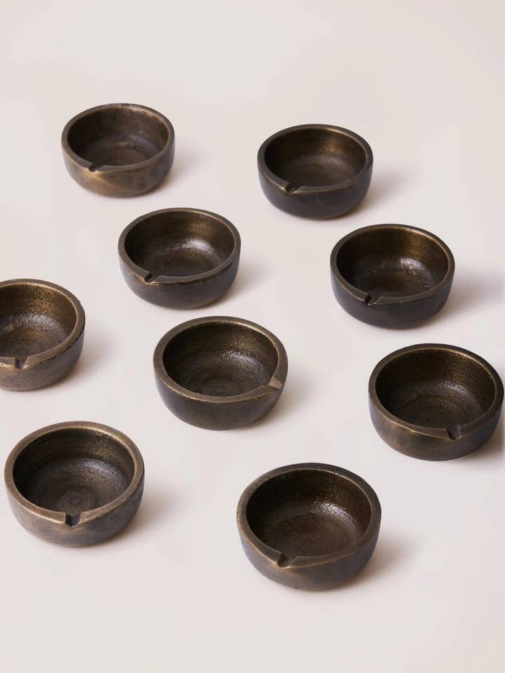 Ensemble de 9 porte-bougies chauffe-plat Umbra pour la vente par Marble Lotus Original