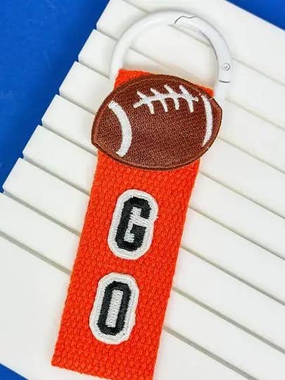 Football Game Day Key Chain - Orange & White for wholesale by Prep Obsessed Wholesale
