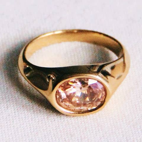 Ring with oval crystal stone - peach for wholesale by Bazou
