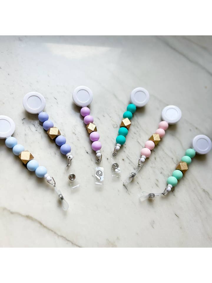 Collezione Solid Group: bobine porta badge per la vendita all'ingrosso da parte di Lanyard Lovebirds