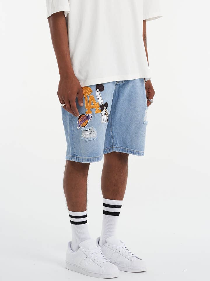 Short déchiré bleu LA Patch Work pour la vente par UNEFFECTED STUDIOS