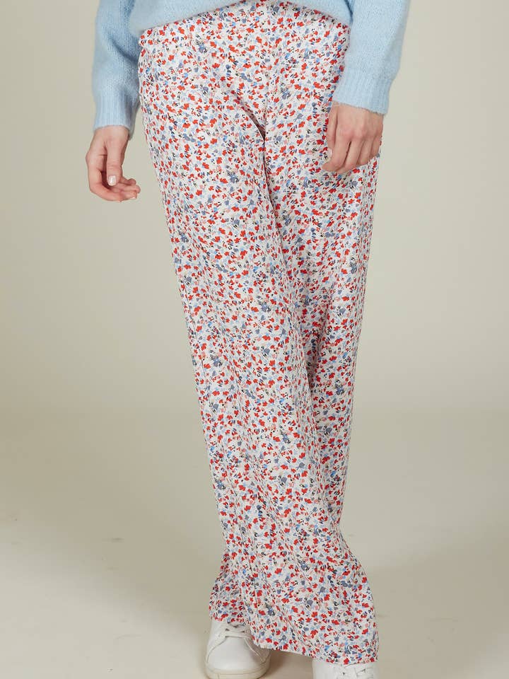 WHITE BABETTE - Loose and flowing floral print pants for wholesale on Faire1