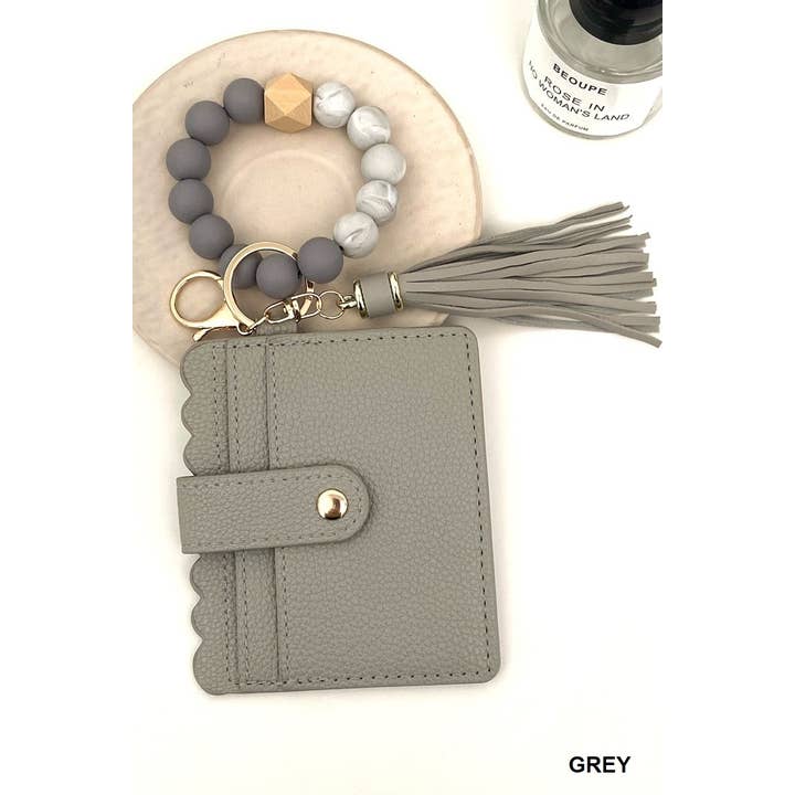 Beaded Bracelet Keychain Card Holder Wallet and other Purchase Wholesale rubber keyrings. Free Returns & Net 60 Terms on Faire trending on Faire.