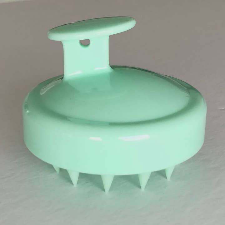 Round portable handheld scalp massager for wholesale by iconic mi