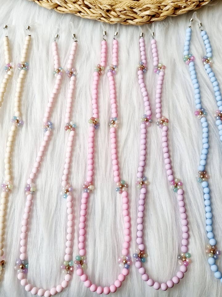 Cordon de lunettes de soleil Daisy pastel pour la vente par Happy by Lies