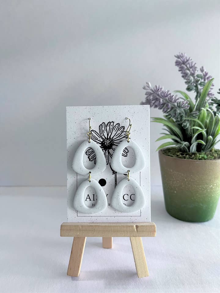 Marisa Speckled White Dangle for wholesale by Daisy & Company