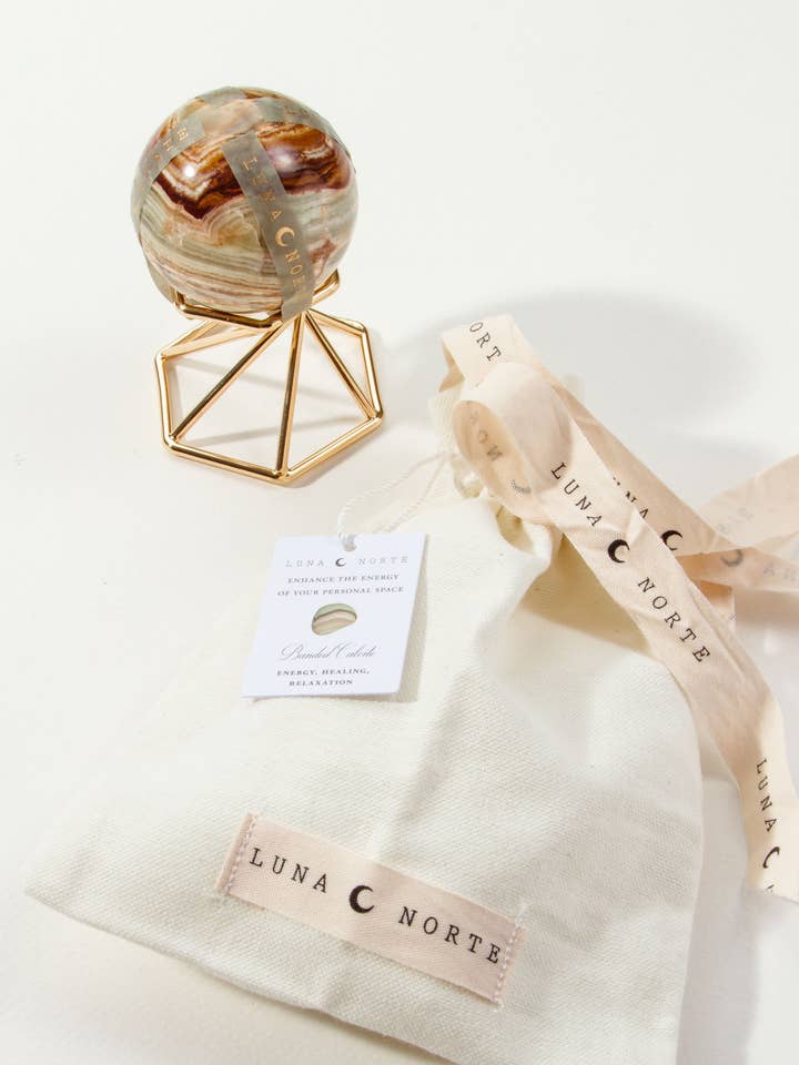 Bandad kalcit sfär Curio med stativ för wholesale av Luna Norte