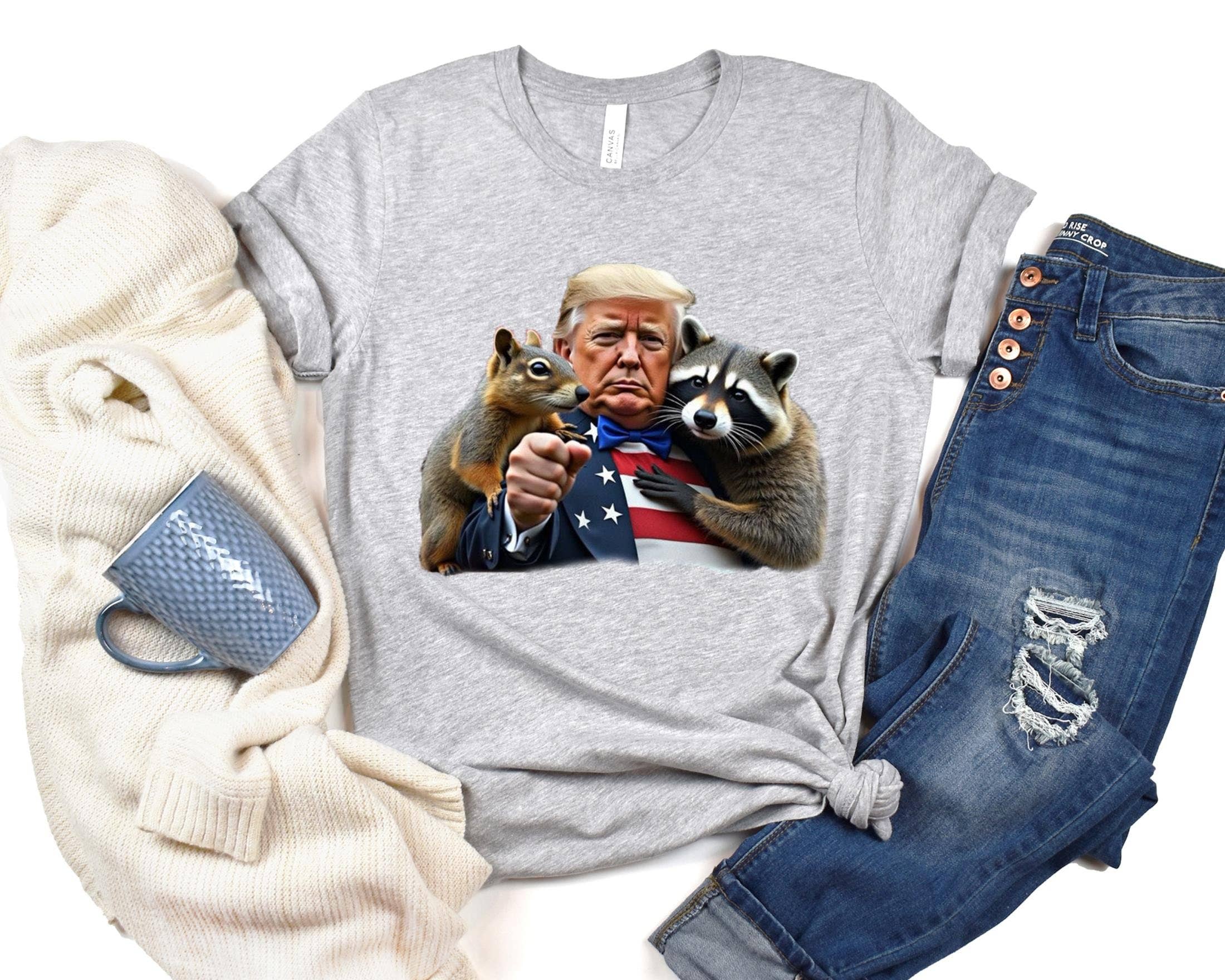 NVC Ecommerce LLC – wholesale T-shirt (graphic) – women's – Trump Peanut Squirrel Raccoon Sweatshirt, Funny Trump  Shirt3