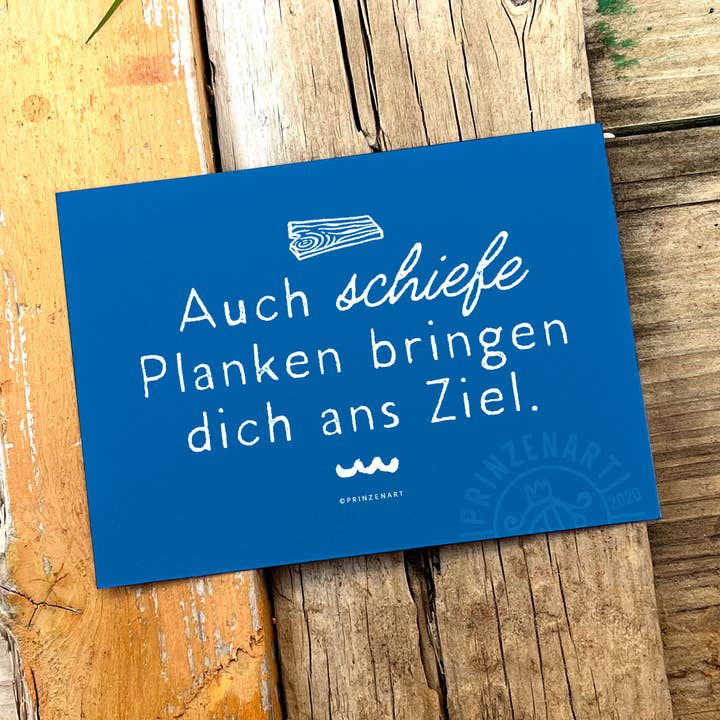 Postcard "Crooked Planks" | Motivational Saying North Sea for wholesale by Prinzenart