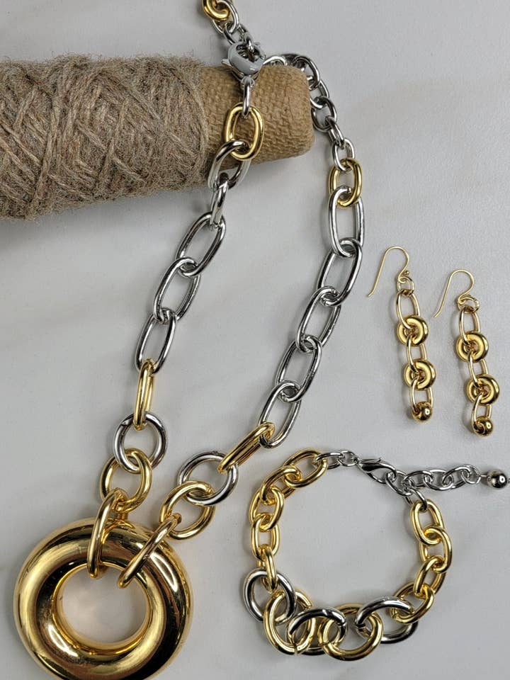 Cadence Necklace Handmade with Rhodium Chain, Gold Plated Chain, and a Large Vintage Centerpiece for wholesale by jfybrand