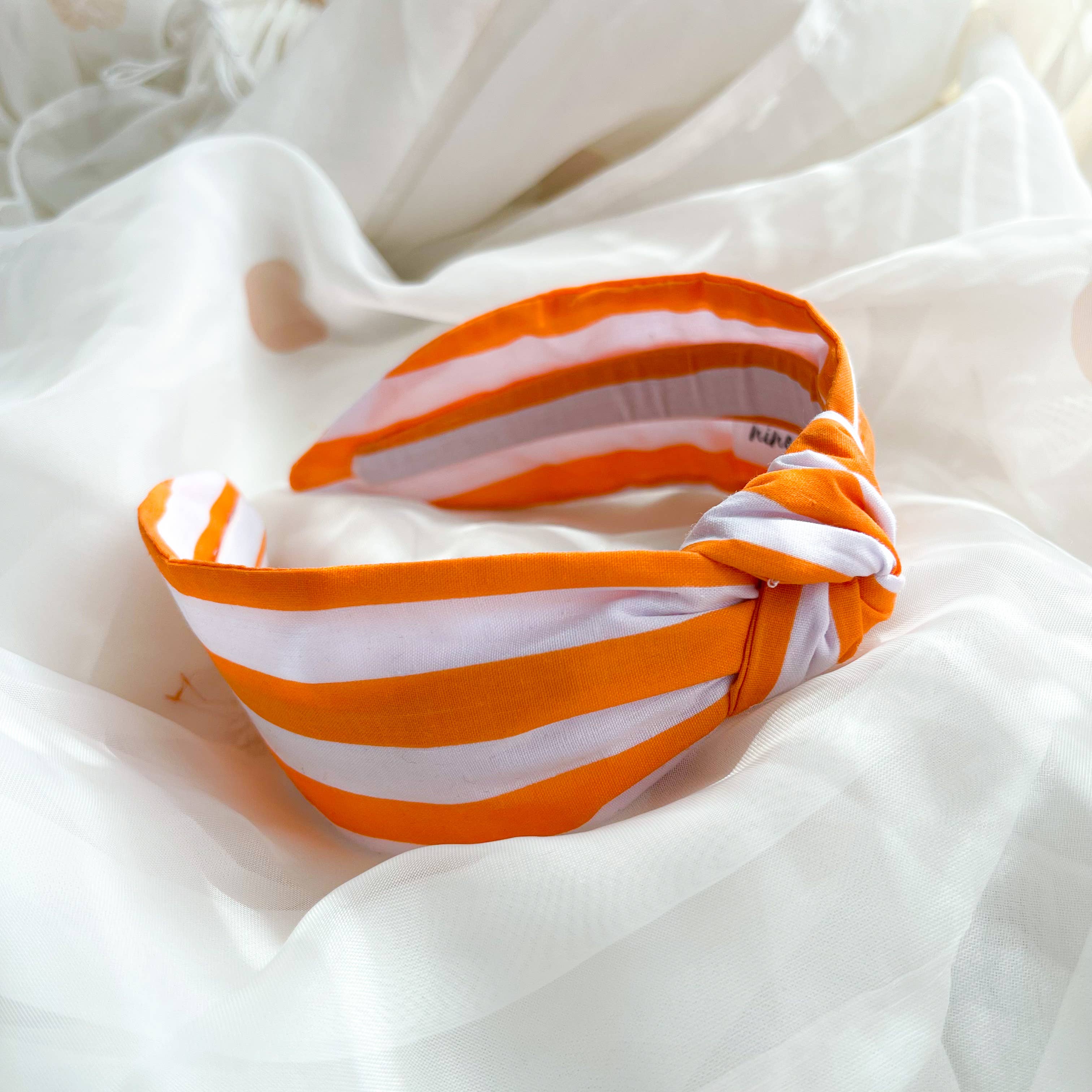 Nine Designs Ltd - Vente Bandeau – femme - Bandeau à nœud à rayures orange, accessoire pour cheveux pour femmes1