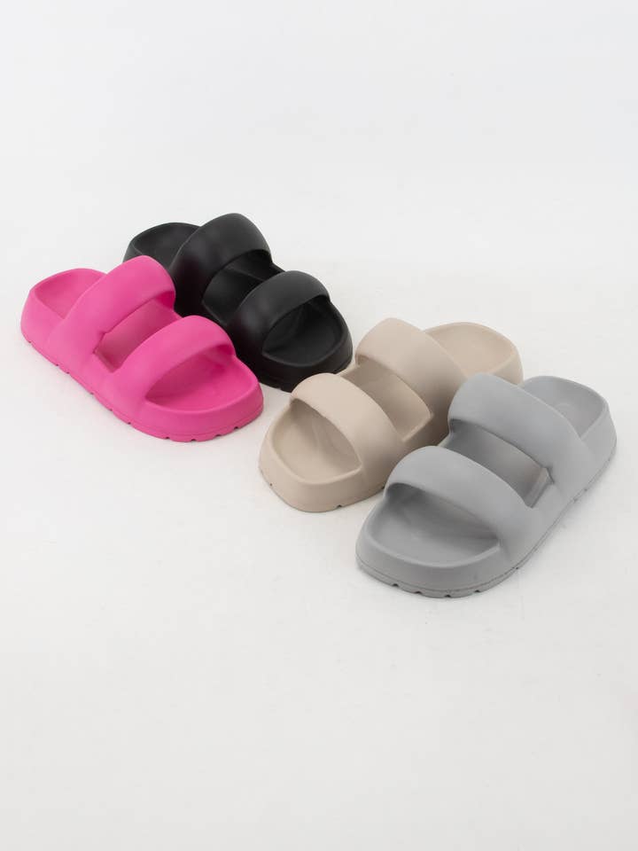 MADLO LIGHTWEIGHT EVA SLIDE SANDAL WITH SOLID DOUBLE STRAP and other Purchase Wholesale half slips. Free Returns & Net 60 Terms on Faire trending on Faire.