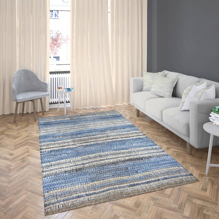 MULTI Indigo vloerkleed van gerecycled denim en leer voor groothandel op Faire
