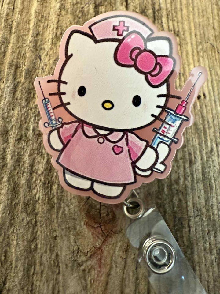 Enrouleur de badge rose HK infirmière pour la vente par The Wild Poppy