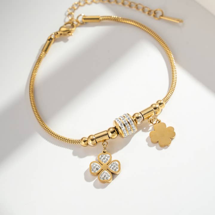 Gold Stainless Steel Bracelet with Chic Clover Flower Charms and other Purchase Wholesale clover bracelet. Free Returns & Net 60 Terms on Faire trending on Faire.