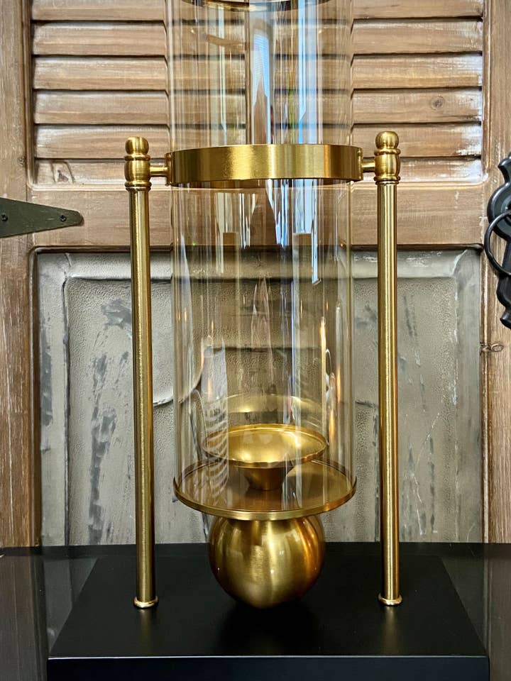 Candle Holder Blk/gld 10"W, 17"H for wholesale by The Light Garden Collection