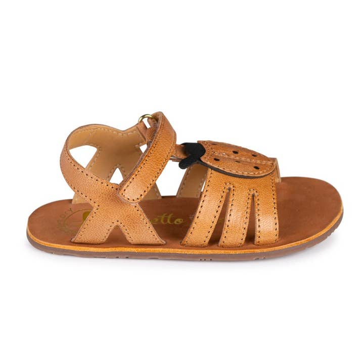 BAREFOOT LEATHER SANDAL - EMBOSSED LADYBUG AND RUSTIC FINISH for wholesale by Chetto