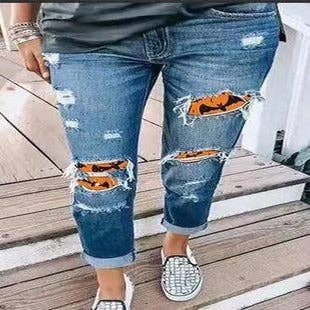 Blue Halloween Pumpkin Print Distressed Straight Leg Jeans for wholesale on Faire2