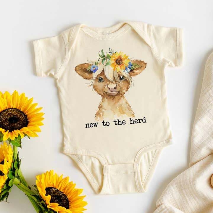 New to the Herd Highland Cow Natural Color Baby Bodysuit for wholesale by Love You a Latte Shop