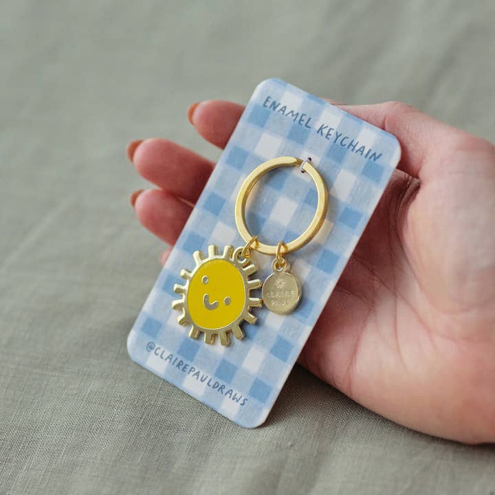 Claire Paul – wholesale Keychain – Women's – Smiley Sun Keyring Charm1