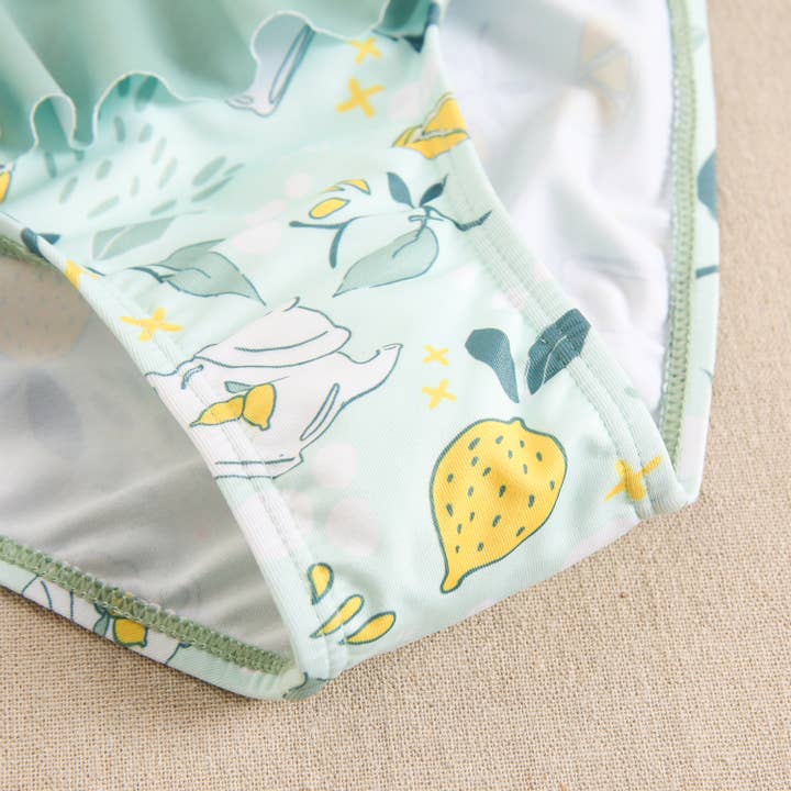 light green Girl's Bikini with Mugs and Lemons Print and Ruffle for wholesale on Faire7