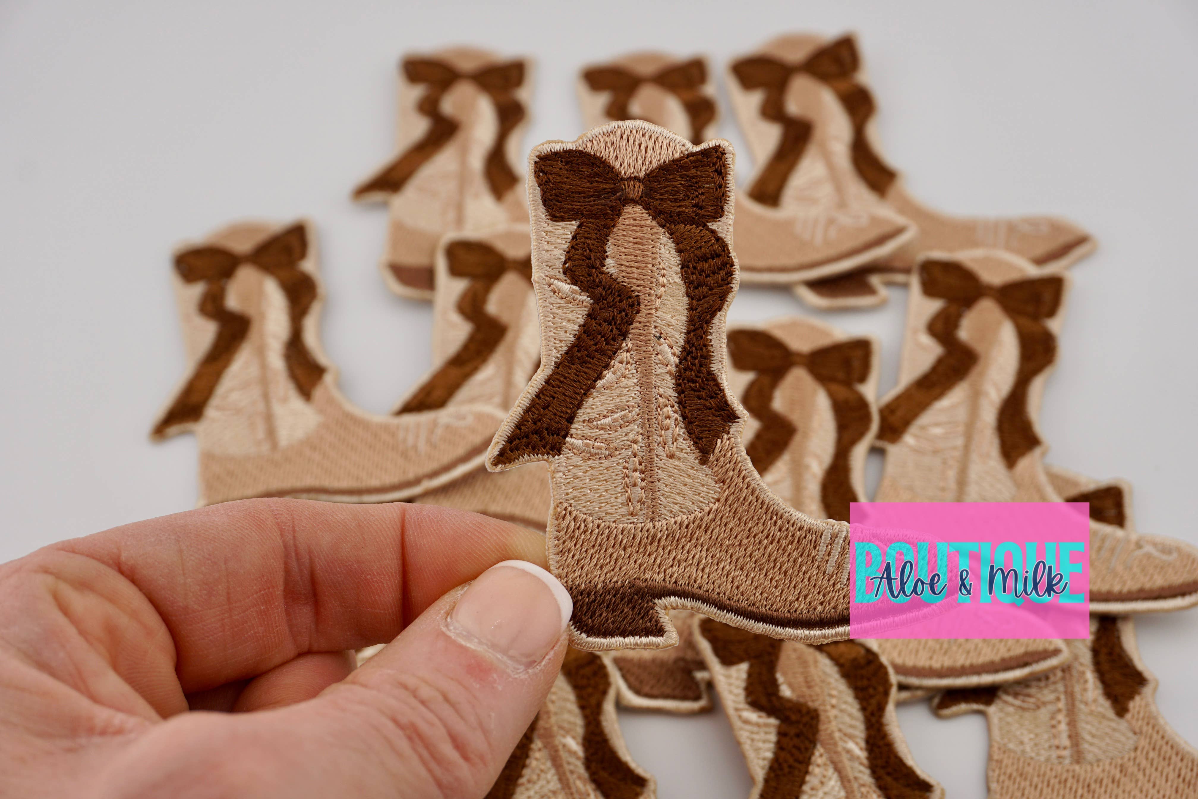Aloe and Milk Boutique – wholesale Hat accessory – Women's – Boot with bow, western patch, cowgirl, cowboy, texas patch3