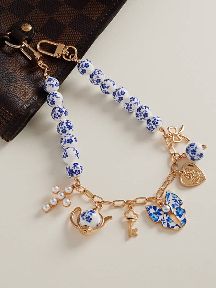 Blandede metalcharms med keramiske perler swag taskecharme for engroshandel hos Designature New York