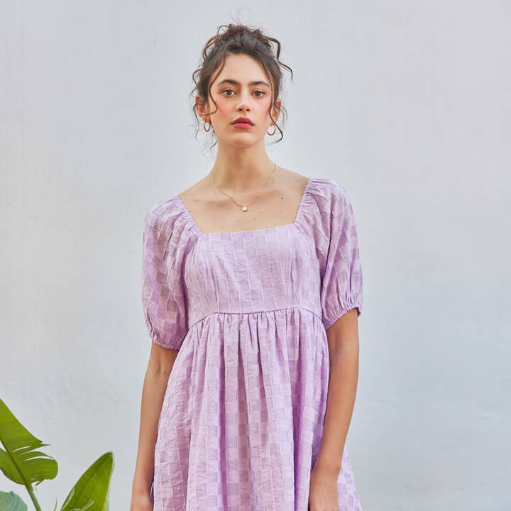 MINI ABITO BABYDOLL TESTURIZZATO CON SCHIENA SMOCCATA per la vendita all'ingrosso da parte di idem ditto