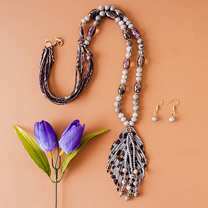Grey Feather Necklace for wholesale on Faire